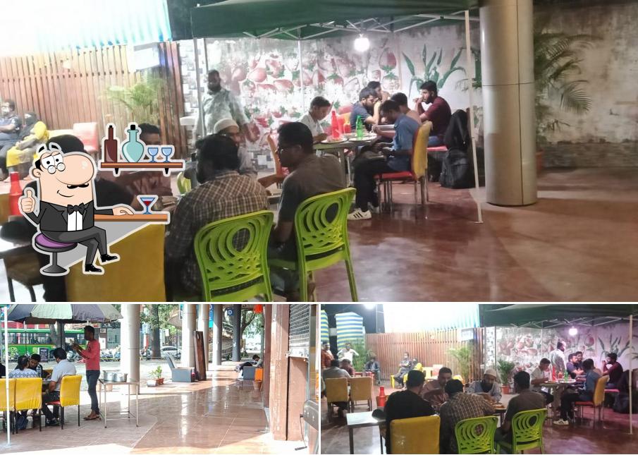 Take a seat at one of the tables at Vishal Restaurant