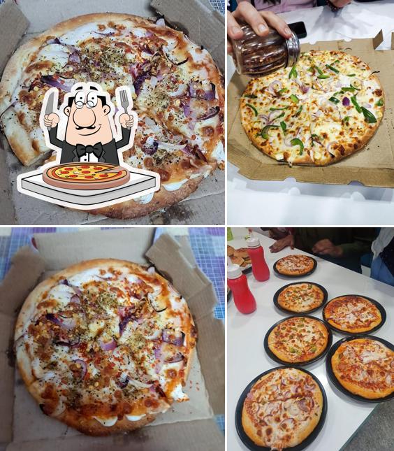 Get pizza at The Pizza Empire Mathura