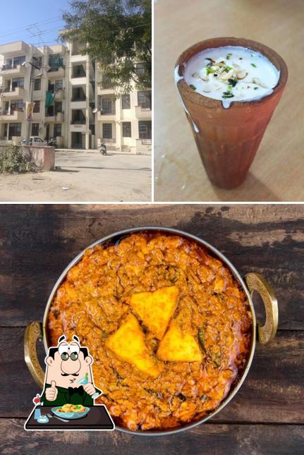 Among various things one can find food and exterior at Aditya tiffin Centrer