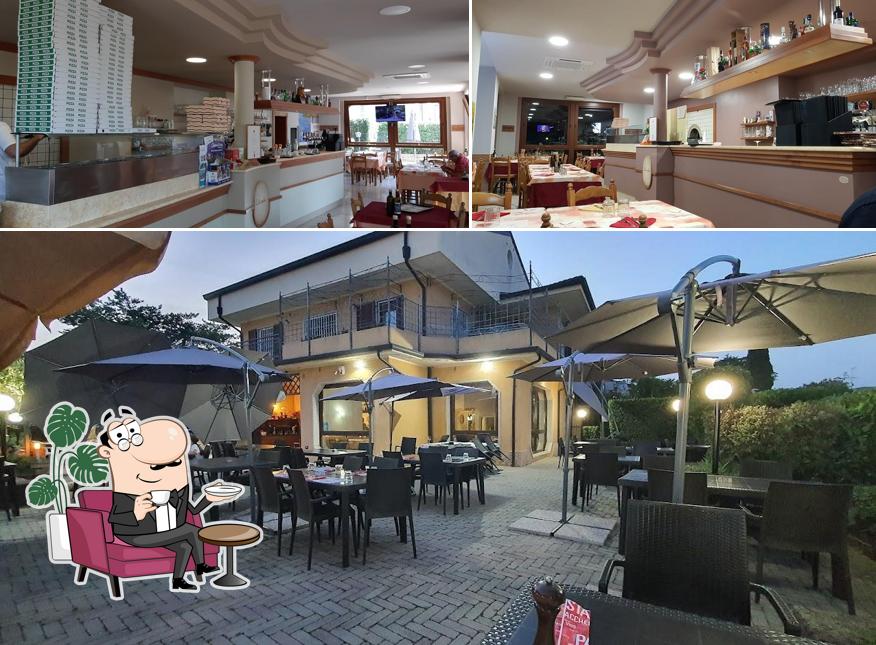 Dai un'occhiata agli interni di Ristorante Pizzeria le Pergole