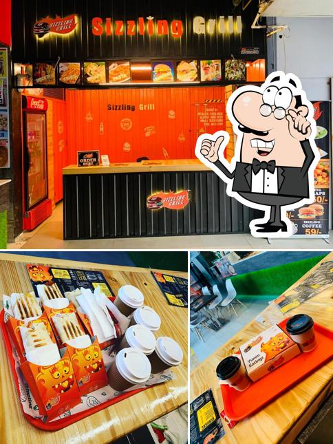 The interior of Sizzling Grill The interior of Sizzling Grill