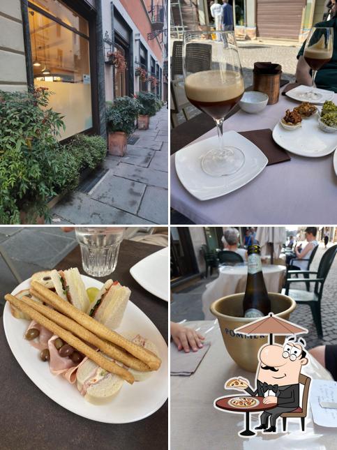 Puoi goderti l'aria fresca da seduto all'esterno di Bar Savoia