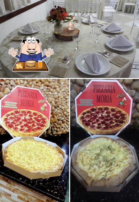 Esta é a foto apresentando comida e mesa de jantar no Pizzaria em Campinas Pizzaria Moriá
