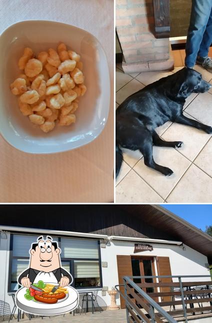 Tra le varie cose da Ristorante Baita del Cacciatore si possono trovare la cibo e interni