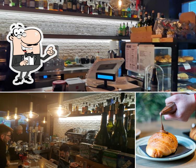 Questa è la immagine che mostra la interni e cibo di Vinsanto Café