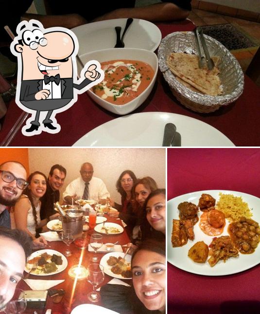 A imagem da interior e comida no Maharani Culinária Indiana Campinas