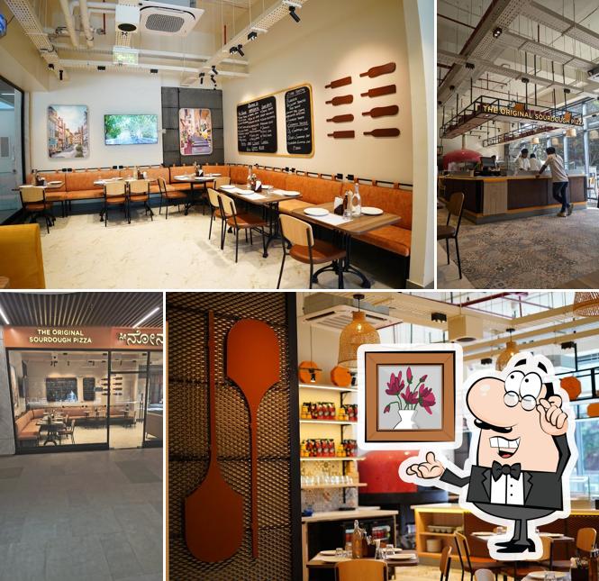 The interior of Si Nonna's - The Original Sourdough Pizza Marksquare Bengaluru