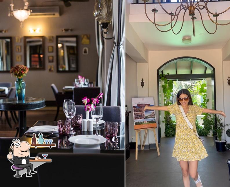 Take a seat at one of the tables at Sol De Goa