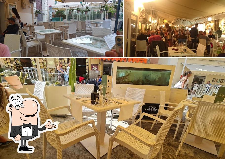 Dai un'occhiata agli interni di That's Amore Ristorante Pizzeria Gourmet - Cucina Tipica Calabrese - Colazione Internazionale e Sapori Autentici