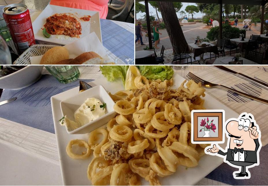 Guarda la foto che mostra la interni e cibo di L'adresse Grado