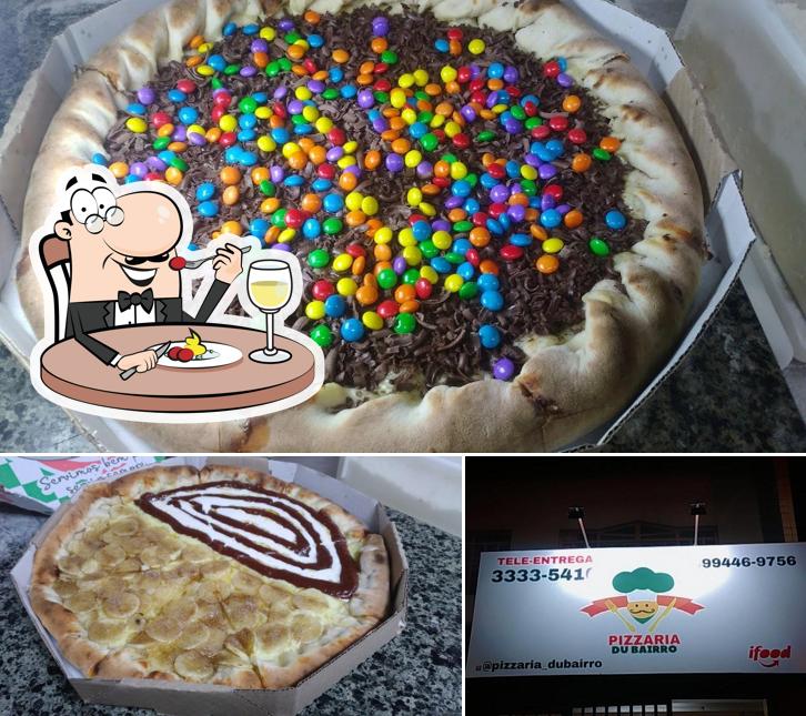 Entre diversos coisas, comida e interior podem ser encontrados no Pizzaria Du_Bairro