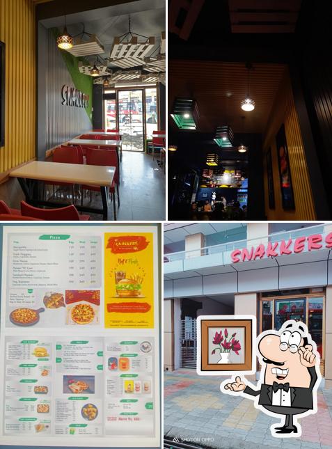 The interior of Snakkers-Pizza Outlet in Amb/Best Restaurant