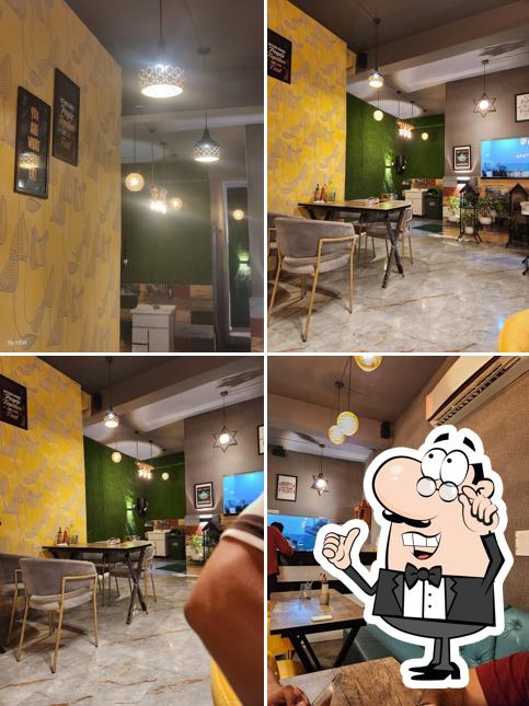 Take a seat at one of the tables at The Fresh Refreshment Point