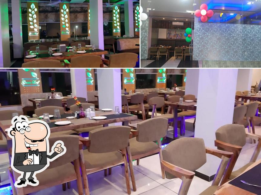 Take a seat at one of the tables at Green Leaf Family Restaurant