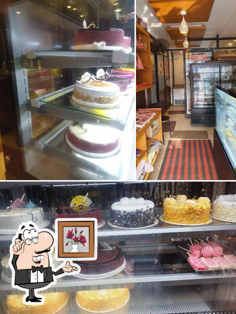 The image of interior and food at Delicia Cake