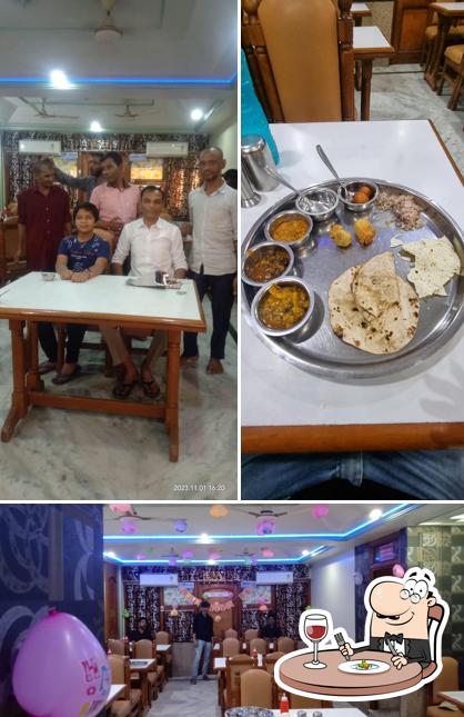 This is the picture showing food and interior at Decent Dining Hall