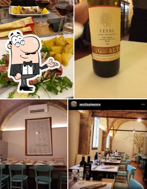 La foto di interni e bevanda da Amos ristorante pizzeria