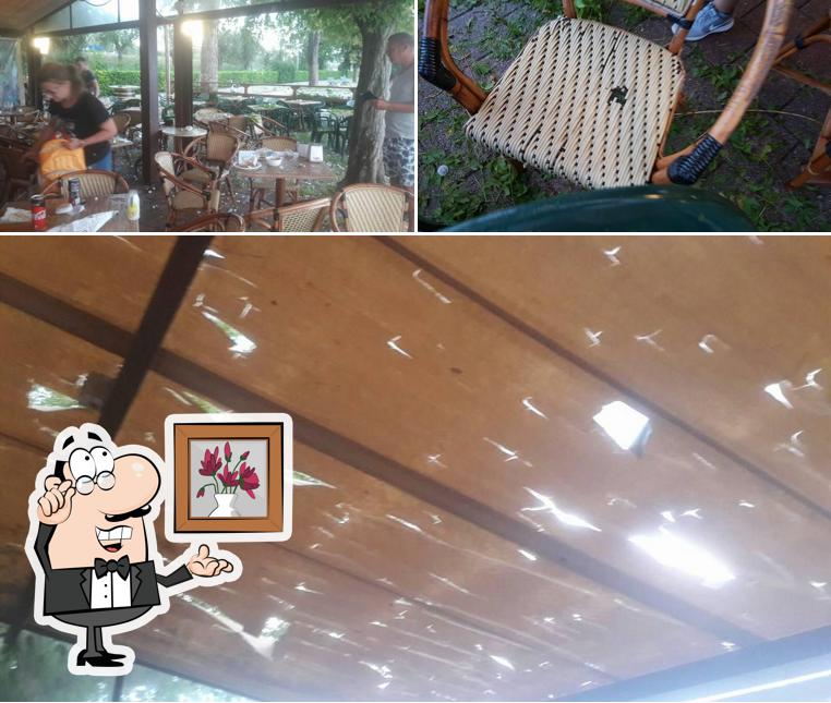 Siediti a un tavolo di Pappagallo Beach