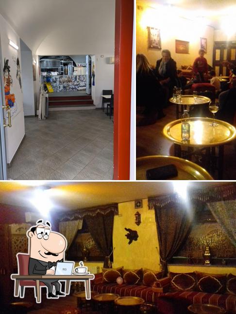 Dai un’occhiata alla immagine che mostra la interni e bancone da bar di Speedy Pizza
