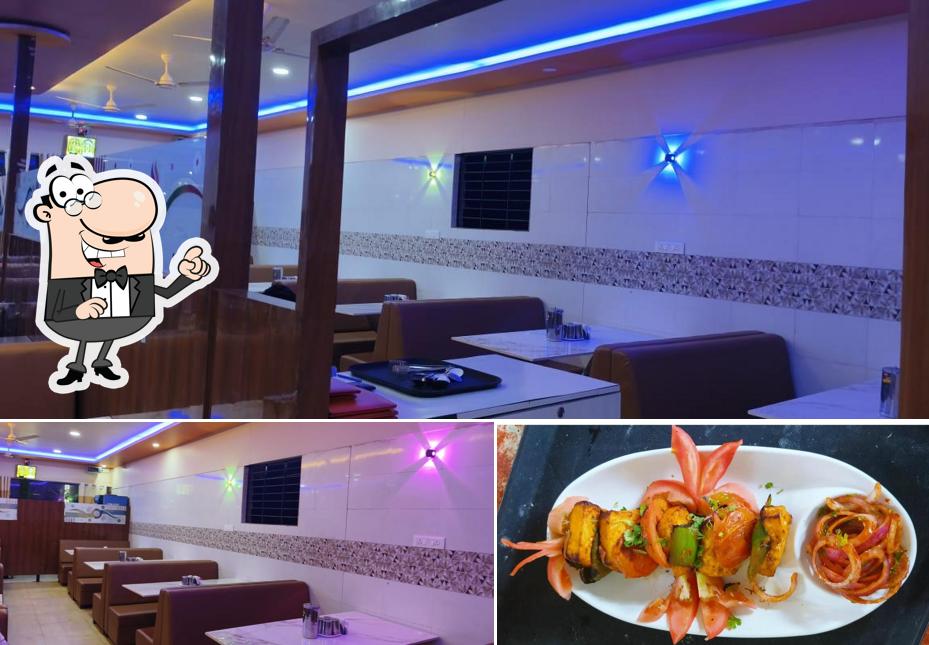 Check out the image displaying interior and food at Rangoli family restaurant