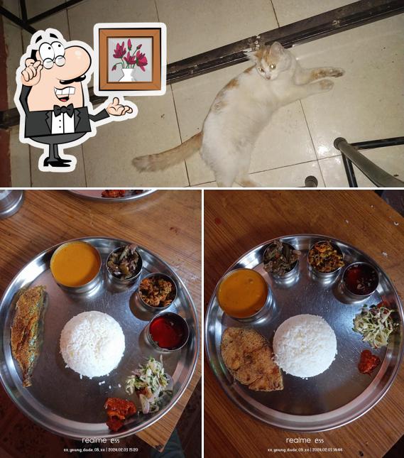 The picture of Srushti Family Restaurants.’s interior and food