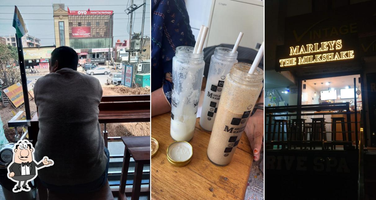 Take a seat at one of the tables at MARLEYS THE MILKSHAKE ( MILKSHAKE , ICE CREAM , BURGER & MORE )