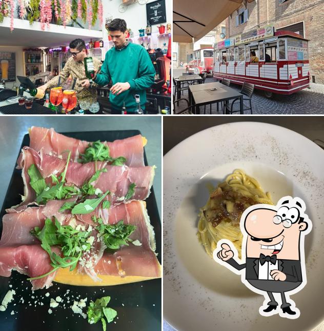 Guarda la foto che presenta la interni e cibo di RIO’S