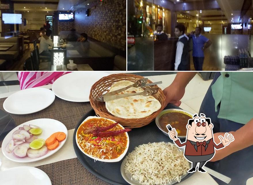 This is the picture depicting food and bar counter at Hotel Sai Pooja Family Restaurant