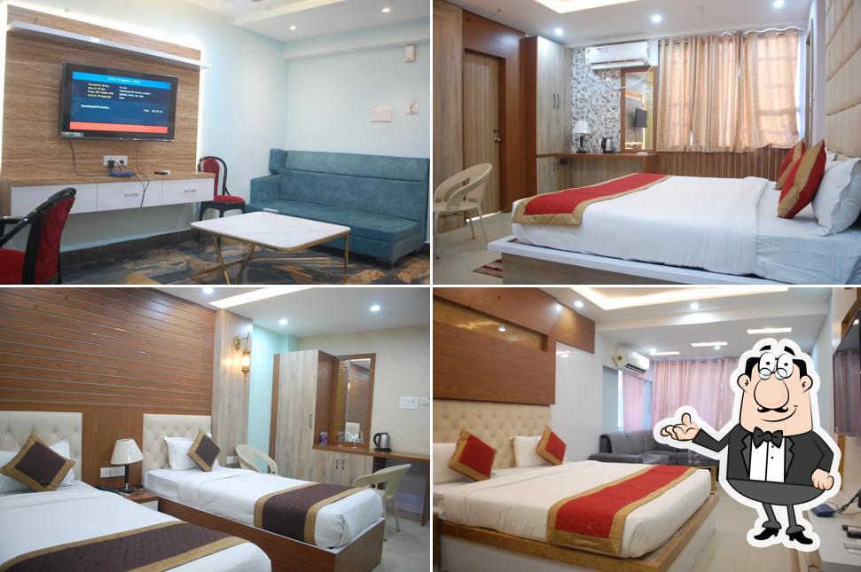 Take a seat at one of the tables at होटल हेरिटेज बोधगया