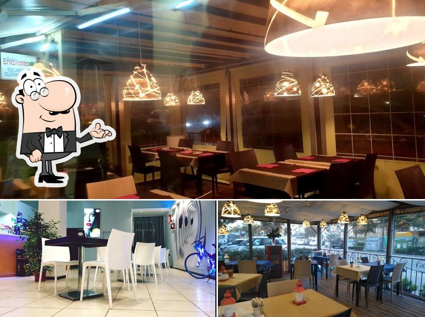 Dai un'occhiata agli interni di PIZZERIA DA EMILIA