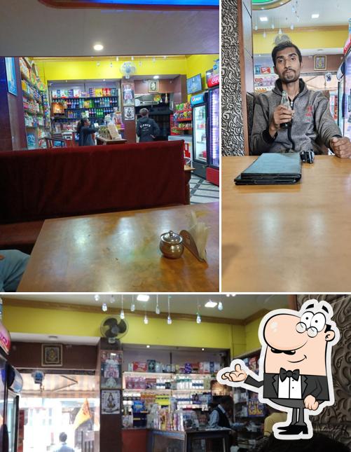 Take a seat at one of the tables at White Orchid Restaurant