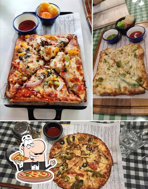 Pick pizza at Bombaye House
