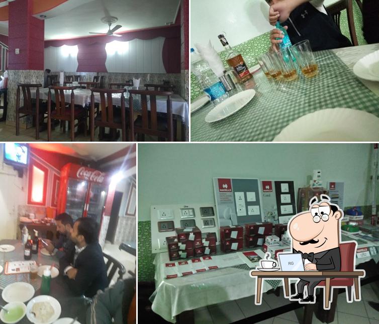 Take a seat at one of the tables at MEHAK RESTAURANT