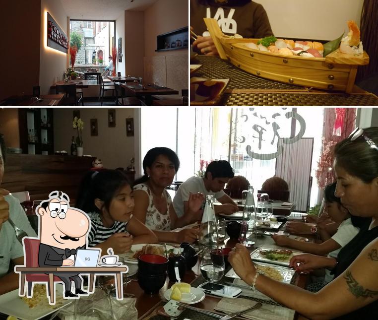 Dai un'occhiata agli interni di Sushi Zen
