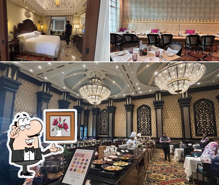 Take a seat at one of the tables at ITC Grandbharat, Aravali Pavilion - Restaurants In Gurgaon