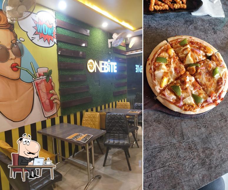 Take a seat at one of the tables at ONE BITE