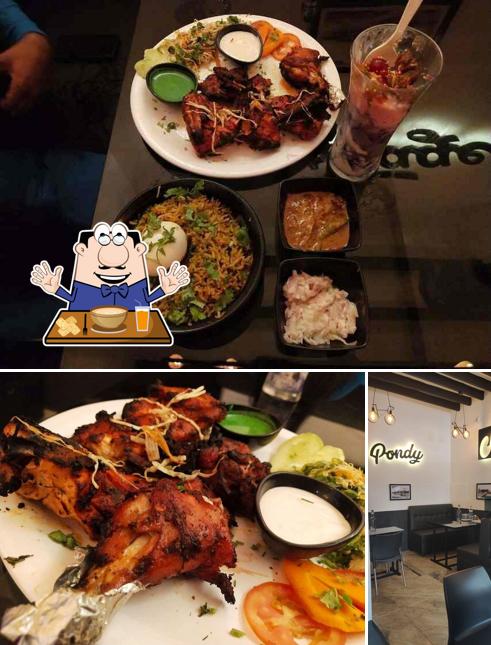 This is the photo showing food and interior at Heritage Pondy Restauarant