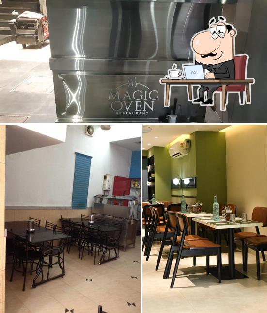 Take a seat at one of the tables at MAGIC OVEN RESTAURANT