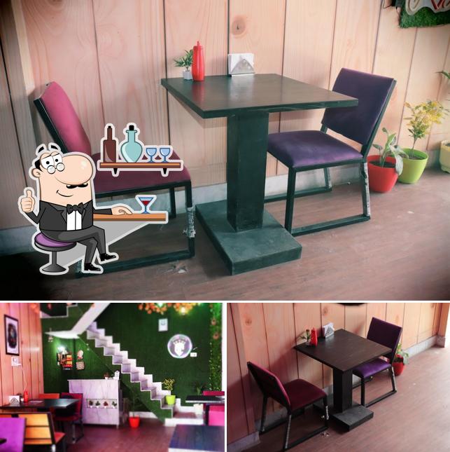 Take a seat at one of the tables at DARK CAFE