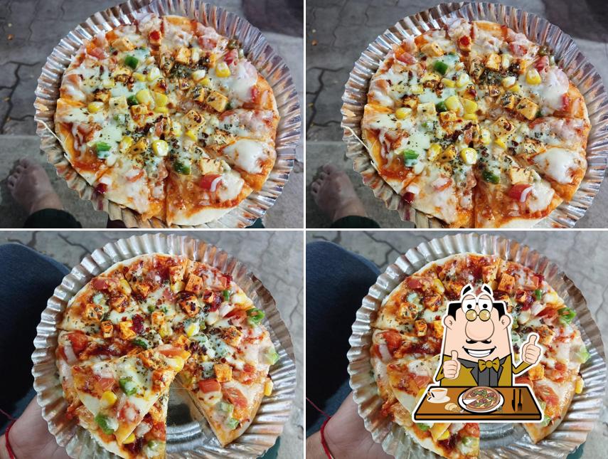 Get pizza at A J Quality snacks