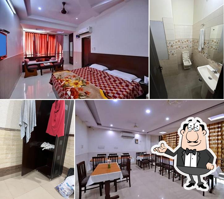 Take a seat at one of the tables at Hotel Malik Regency Ambala City