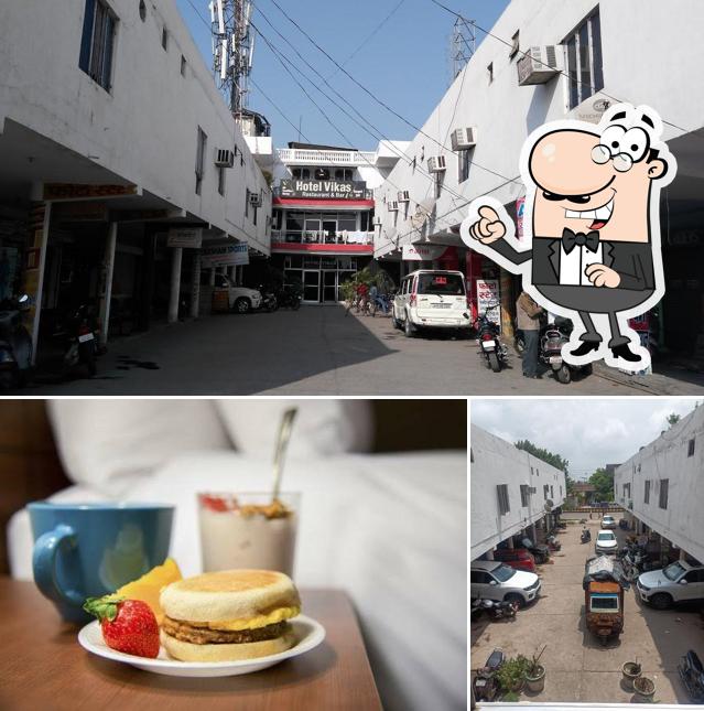 Take a look at the image displaying exterior and food at Vikas Bar