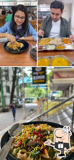 Take a seat at one of the tables at Simm Kitchen