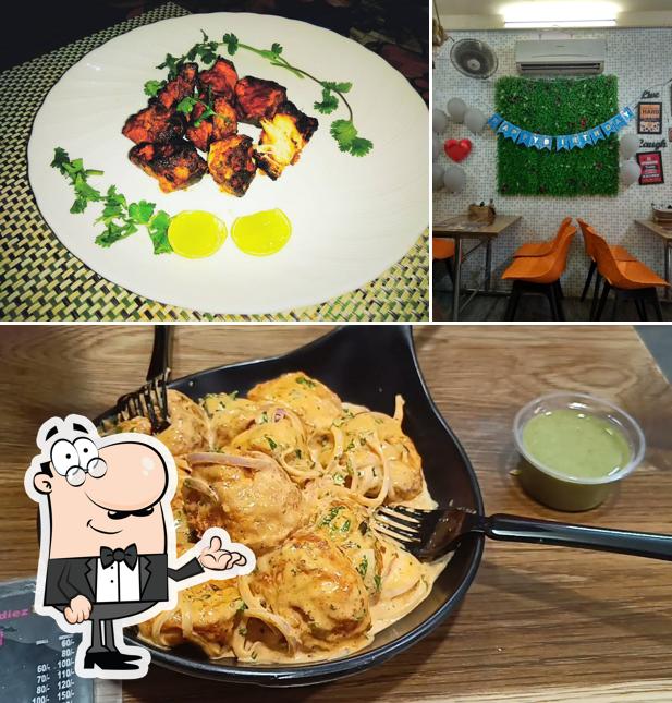 The picture of Foodiez Hub’s interior and food