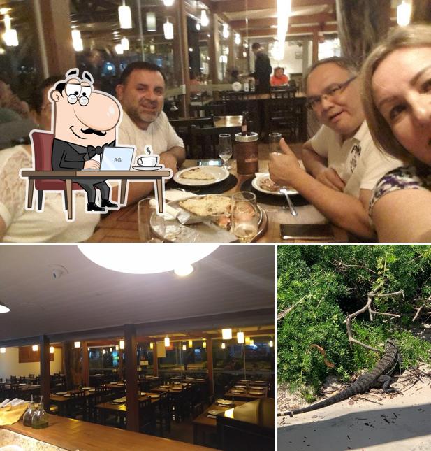 Sente em uma das mesas no La botte pizzaria italiana