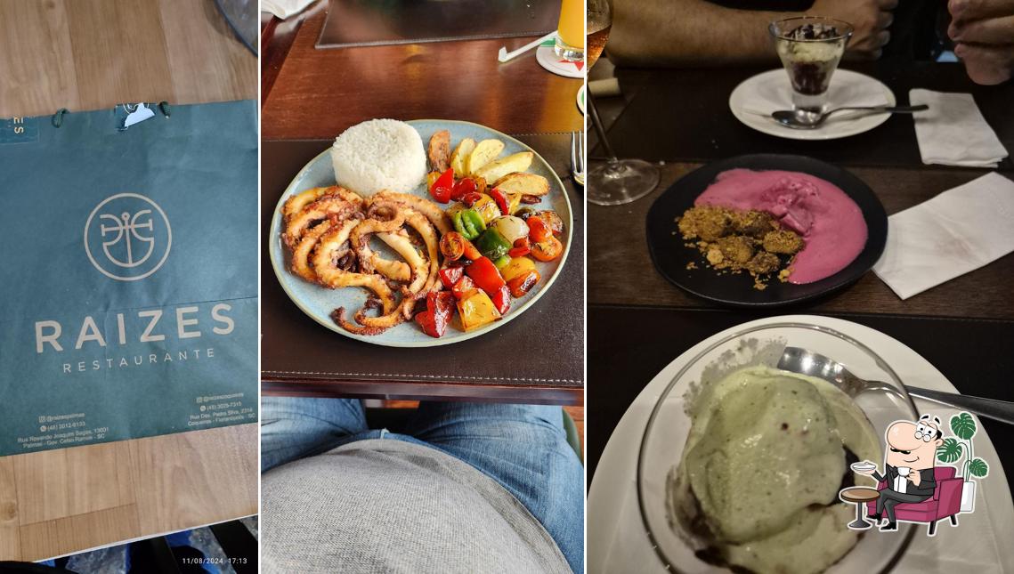 Sente em uma das mesas no Restaurante Raizes