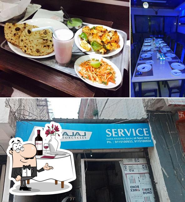 The picture of dining table and exterior at Hotel Mittaso Best hotel in chandigarh best hotel in zirakpur party hall in chandigarh veg hotel in chandigarh