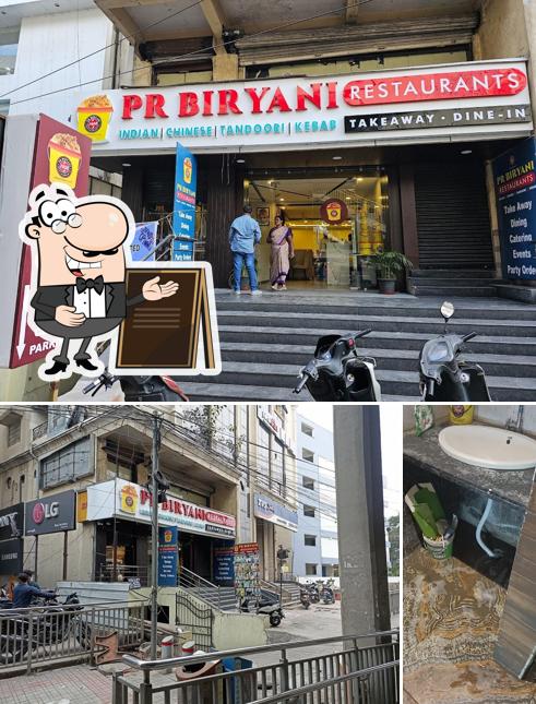 Take a look at the picture showing exterior and beverage at PR biryani restaurants