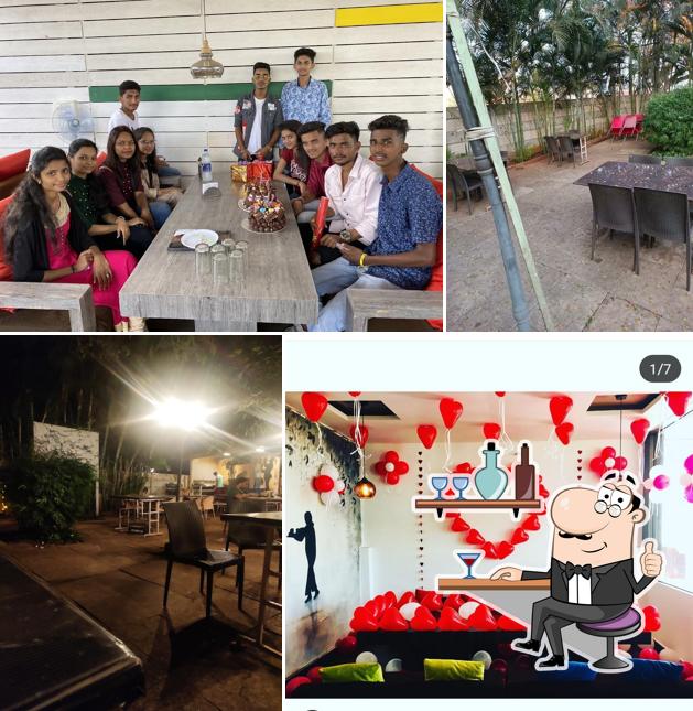 Take a seat at one of the tables at New Hangout D Garden Lounge