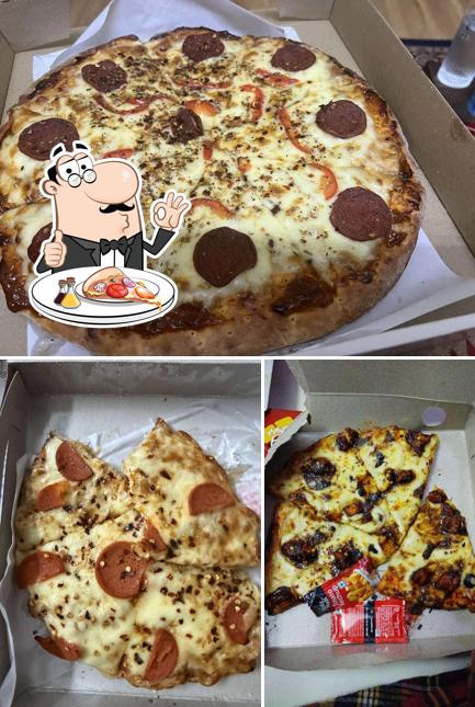 Get pizza at Break Time Resto Cafe - Manacaud